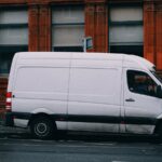 a white van parked on the side of the road